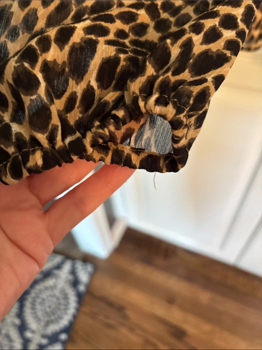 J Crew trendy animal print blouse with sheer sleeves and smocking at neckline